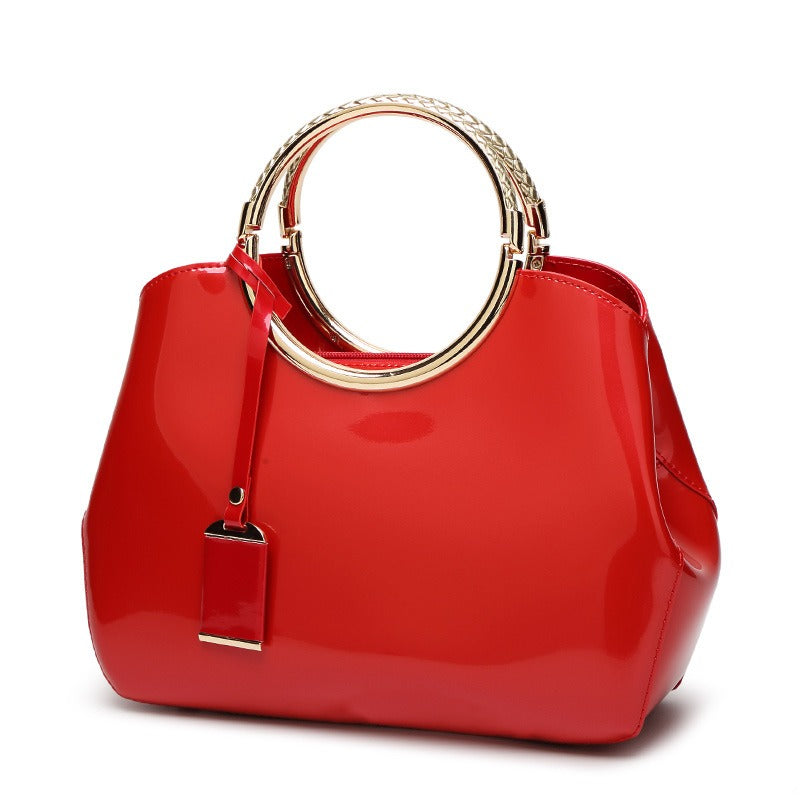 Shiny patent leather handle crossbody handbag bridal bag